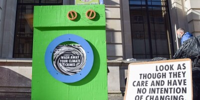 Greenwashing protest from Alamy 9Nov2021 cropped 575x375