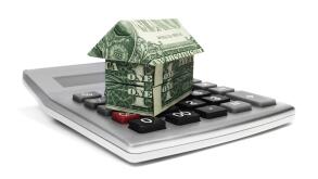 Calculator with origami house. Home equity with calculator and origami home.