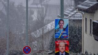 Election posters of Alice Weidel of the AfD and German Chancellor Olaf Scholz are fixed at lamp poles in Niederreifenberg near Frankfurt, Germany, Thursday, Feb. 13, 2025. (AP Photo/Michael Probst)