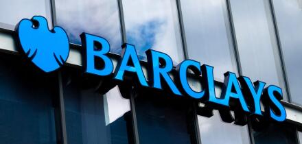 Barclays blue sign on a bank window in Newcastle.