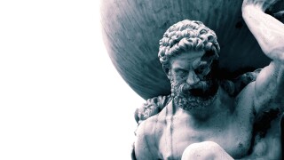 Statue of the Greek God Atlas holding the globe on his shoulders