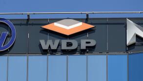 Bucharest, Romania - August 16, 2021: A logo of WDP, Warehouses De Pauw, Belgium logistics for warehouse rentals company, is displayed on the top of a
