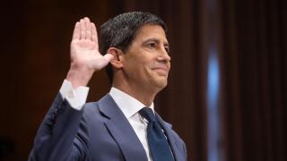 Kevin Warsh, nominee for Federal Reserve chair, is sworn in to testify during his confirmation hearing before the Senate Banking Committee on Capitol Hill on April 21, 2026. (Francis Chung/POLITICO via AP Images)