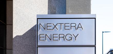 Houston, Texas, USA - February 27, 2022: NextEra Energy sign is seen at its office building in Houston, Texas, USA.