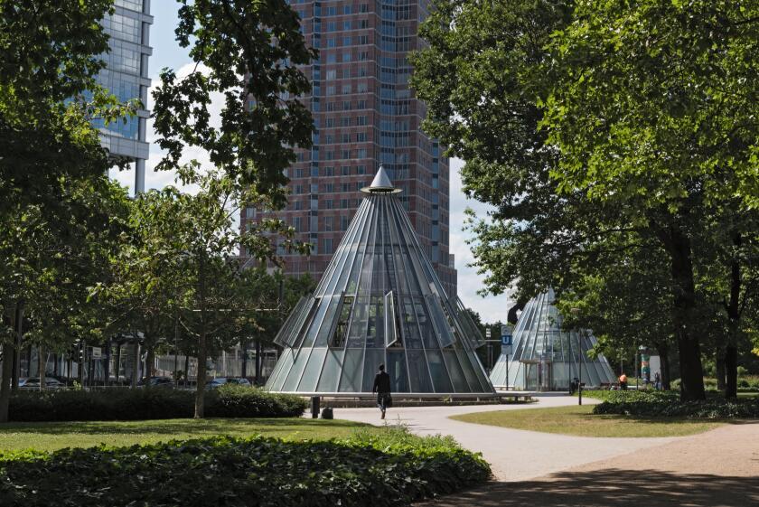 Messeturm and subway station at the Friedrich Ebert Anlage in Frankfurt, Germany