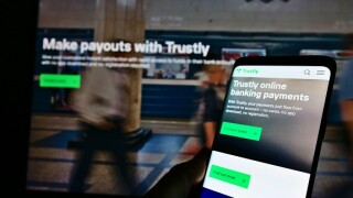 Trustly_phone_logo_screen_575x375_alamy_April12