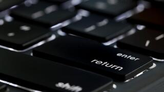 Illuminated Apple Macbook Pro keyboard return key - USA