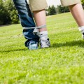 Boy and girl ready for a 3-legged race