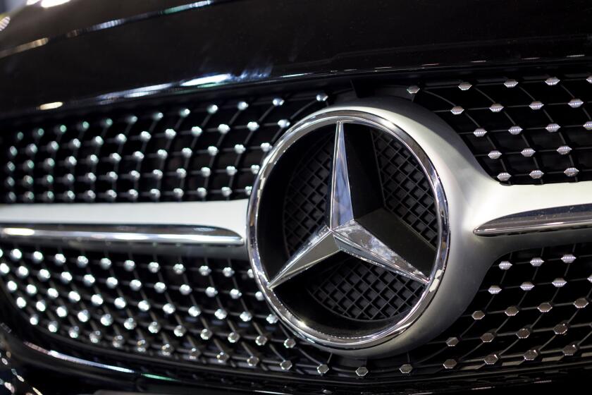 Mercedes insignia on a luxury car