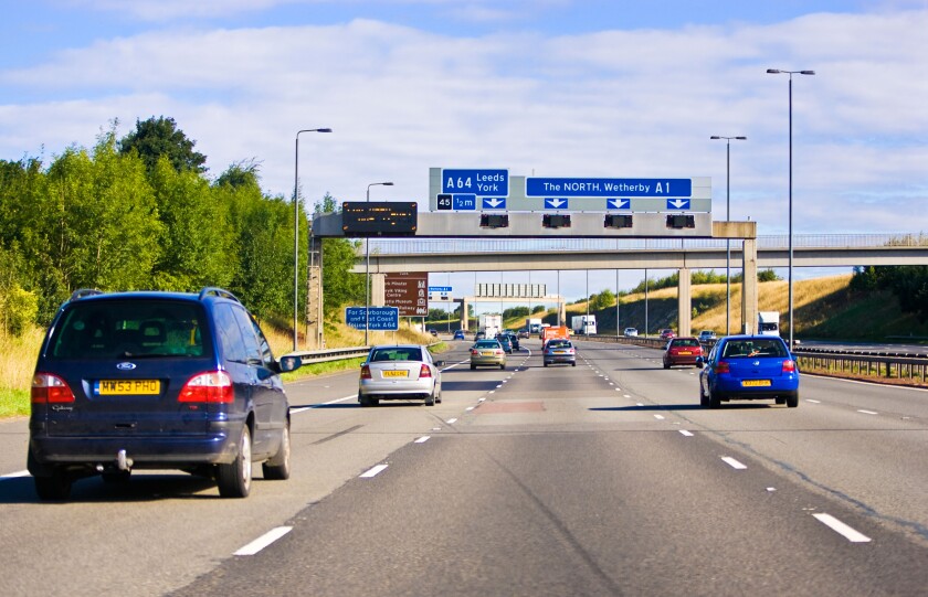 Motorway traffic in the UK. Cars driving on British motorways in England