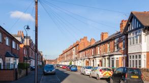 Typical city residential street with mixed styles of housing in the older part of The Meadows, Nottingham, England, UK