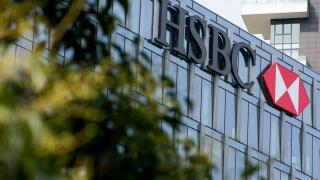 A logo sign outside of a facility occupied by HSBC Bank in Milan, Italy on September 3, 2016.