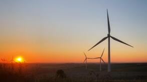 Renewable Energy - Cornwall Wind Turbines flowing in the sunset.