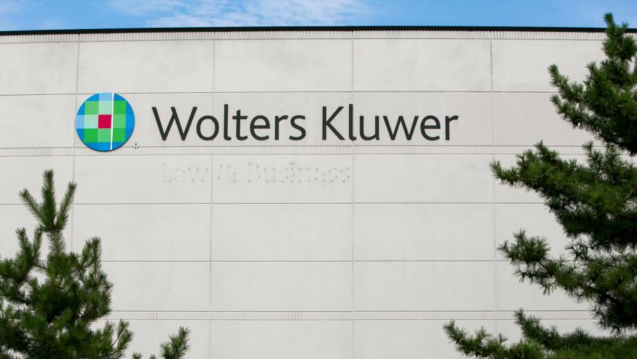 A logo sign outside of a facility occupied by Wolters Kluwer in Frederick, Maryland on August 30, 2015.