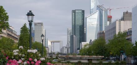 Early morning street scene in Neuilly Sur Seine looking towards La Defense and the Paris Business District