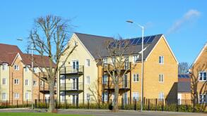 New mixed housing development along main road nearing completion (few occupied some empty) Harold Hill Romford East London England UK