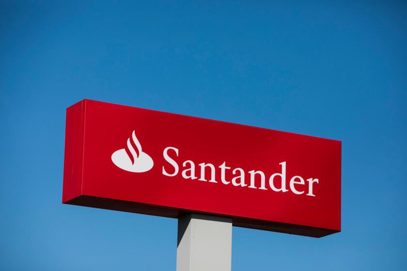 A logo sign outside of a Santander Bank branch in Camp Hill, Pennsylvania on July 30, 2017.
