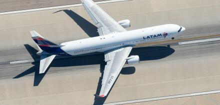 Aerial view of LATAM Airlines Boeing 767 CC-CXE departing LAX airport bound for Santiago (SCL), Chile. Widebody long haul aircraft seen from above.