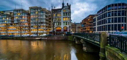 Buildings and bridge over the Singel Canal, in Amsterdam, The Netherlands.