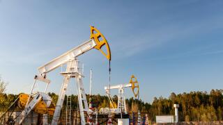 Oil pump rig. Oil and gas production. Oilfield site. Pump Jack are running. Drilling derricks for fossil fuels output and crude. Image shot 06/2020. Exact date unknown.