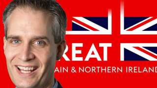 Dan Ramsay with GBNI poster.jpg