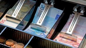 Euro bank notes and coins in a cash register, Stuttgart, Baden-Wuerttemberg
