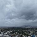 Clouds cover Kingston, Jamaica, ahead of the forecast arrival of Hurricane Melissa on Sunday, Oct. 26, 2025. (AP Photo/Matias Delacroix)