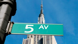 Fifth Avenue street sign with the Empire State Building behind, Manhattan, NYC, New York City, NY, USA. Image shot 05/2008. Exact date unknown.