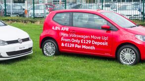 Cars outside Volkswagen dealer. England. UK