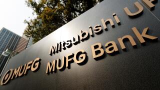 A new signboard of MUFG on display outside its building on April 2, 2018, Tokyo, Japan. Mitsubishi UFJ Financial Group Inc. changed the name of Bank of Tokyo-Mitsubishi UFJ to MUFG Bank after 11 years of merger and complaints from customers saying that th