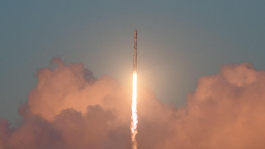 The SpaceX Falcon 9 rocket lifts off carrying the Echostar 105/SES-11 communications satellite streaks from Space Launch Complex 39A at the Kennedy Space Center October 11, 2017 in Cape Canaveral, Florida.