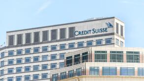 Credit Suisse bank building at Canary Wharf, Isle of Dogs, London, England, as seen from the river Thames.