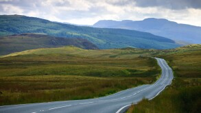 empty road running through rural countryside
