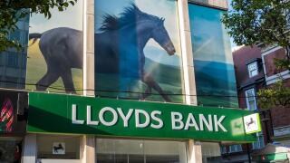 Lloyds bank with picture of black horse above the branch on Oxford street, London, England, U.K.