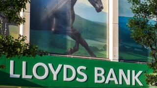 Lloyds bank with picture of black horse above the branch on Oxford street, London, England, U.K.