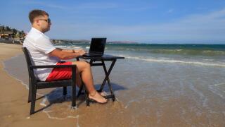 Business Man Working on Tropical Beach