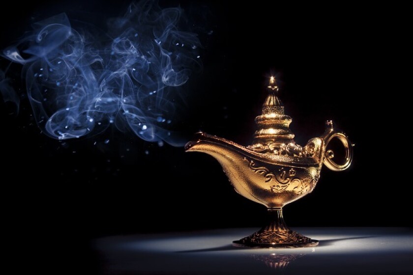 Magic Aladdin's Genie lamp on black with smoke