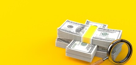 Dollar_search_magnifying_glass_Adobe_575x375_220120