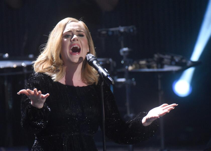 Huerth, Germany. 06th Dec, 2015. The singer Adele performs on stage during RTL's end-of-year review '2015! Menschen, Bilder, Emotionen' (lit. People, images, emotions) in Huerth, Germany, 06 December 2015. Photo: HENNING KAISER/dpa/Alamy Live News