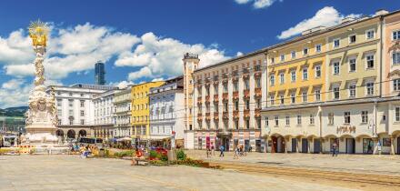 Linz - June 2020, Austria: View of the main square of Linz with colorful buildings in the traditional architectural style