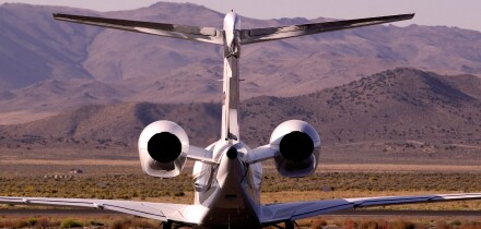 Rear view of Executive Jet on air strip apron in Nevada USA