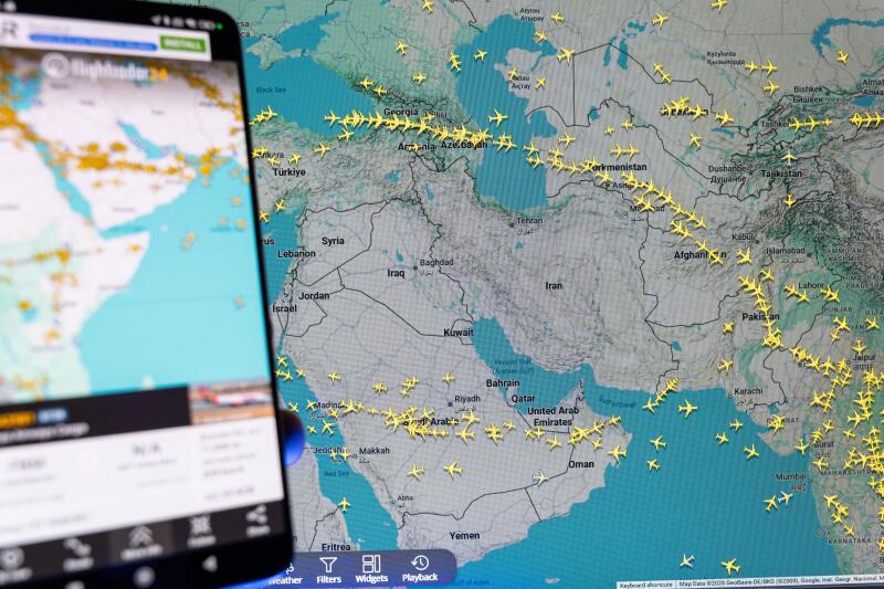 Flightradar24 mobile app displaying real-time global flight tracking map over the Middle East and Iran, aviation monitoring and commercial air traffic