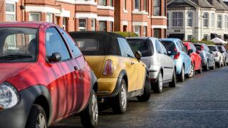 Cars parked on the side of a road