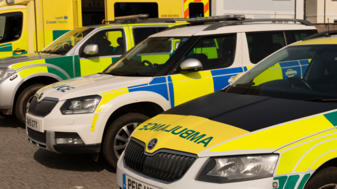 UK Emergency vehicles waiting on Discovery Quay on the waterfront of Falmouth, England