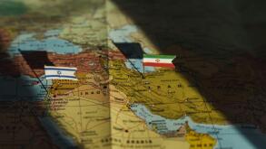 Iran and Israel flags on Middle east geopolitical map. Crisis and war between Israeli and Iran islamic republics. High quality photo