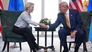President Donald Trump and European Commission President Ursula von der Leyen shake hands after reaching a trade deal at the Trump Turnberry golf course in Turnberry, Scotland Sunday, July 27, 2025. (AP Photo/Jacquelyn Martin)
