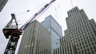 Crane used to build the Random House building in New York  City.  Building at right-- Mony Tower at 1740 Broadway.
