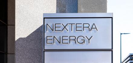 Houston, Texas, USA - February 27, 2022: NextEra Energy sign is seen at its office building in Houston, Texas, USA.