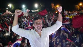 Santiago Pena, presidential candidate of the Colorado party cheers during a political rally at Asuncion, Paraguay, Tuesday, April 18, 2023. Paraguay´s general elections are scheduled for April 30th. (AP Photo/Jorge Saenz)