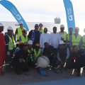 Mobily staff celebrate the successful landing of the Africa-1 cable in Duba, Saudi Arabia